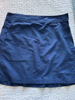 Rip Skirt Hawaii Navy Mini wraparound Skirt 
17” length 
Size medium